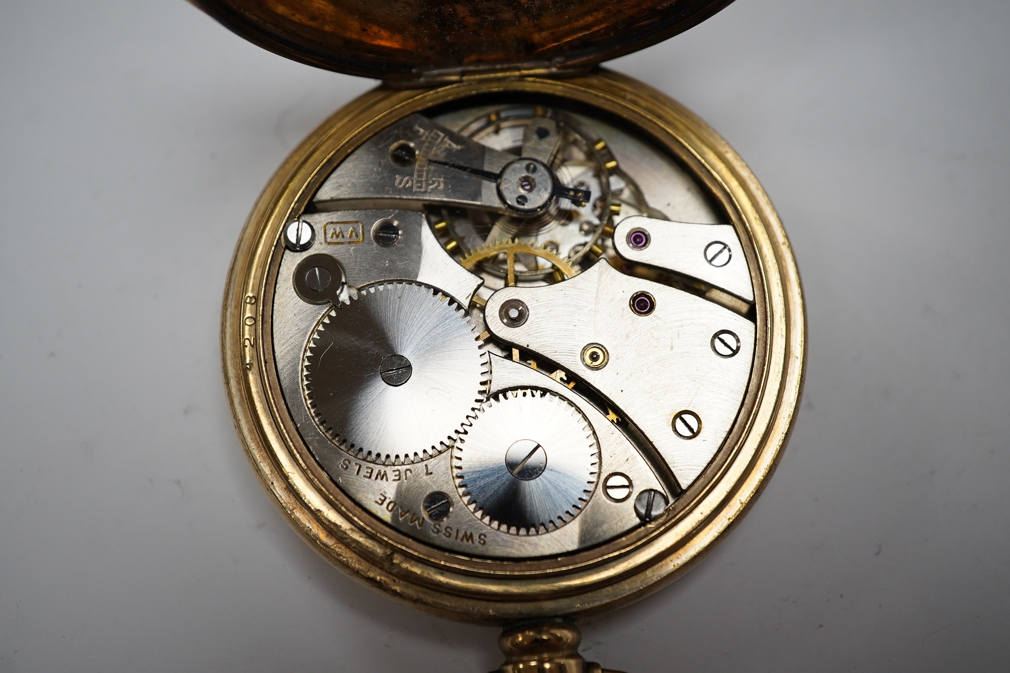 A gold plated Vertex hunter pocket watch and a George V silver mounted glass desk timepiece, with pig finial, height 95mm. Condition - poor.